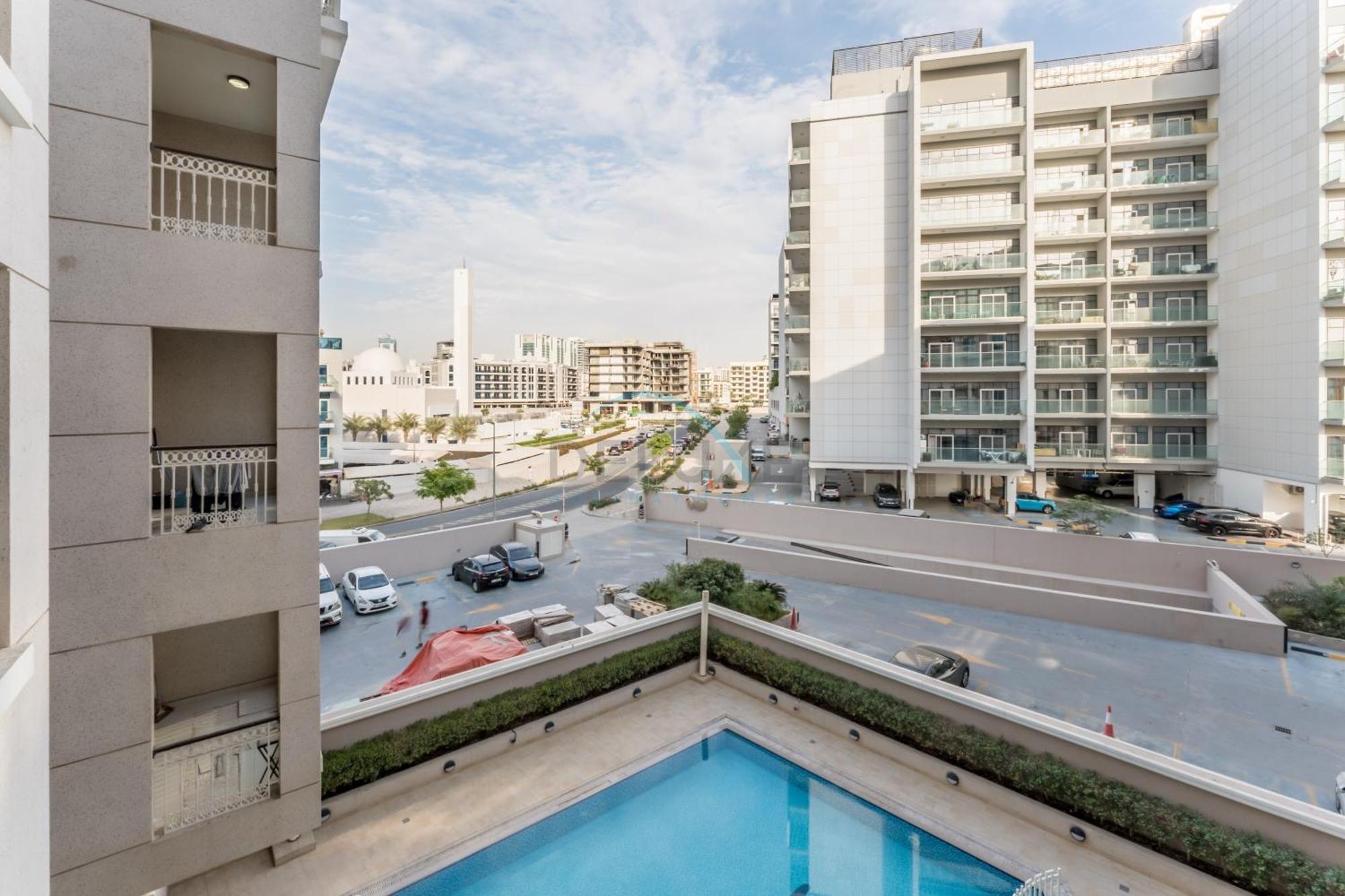 Near Major Tourist Destinations, Balcony Overlooking Community And Pool, Burj View Residence, Arjan Dubai